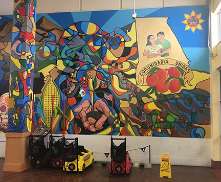 “comunidades unidas” mural at another Latino ethnic mall in suburban Atlanta